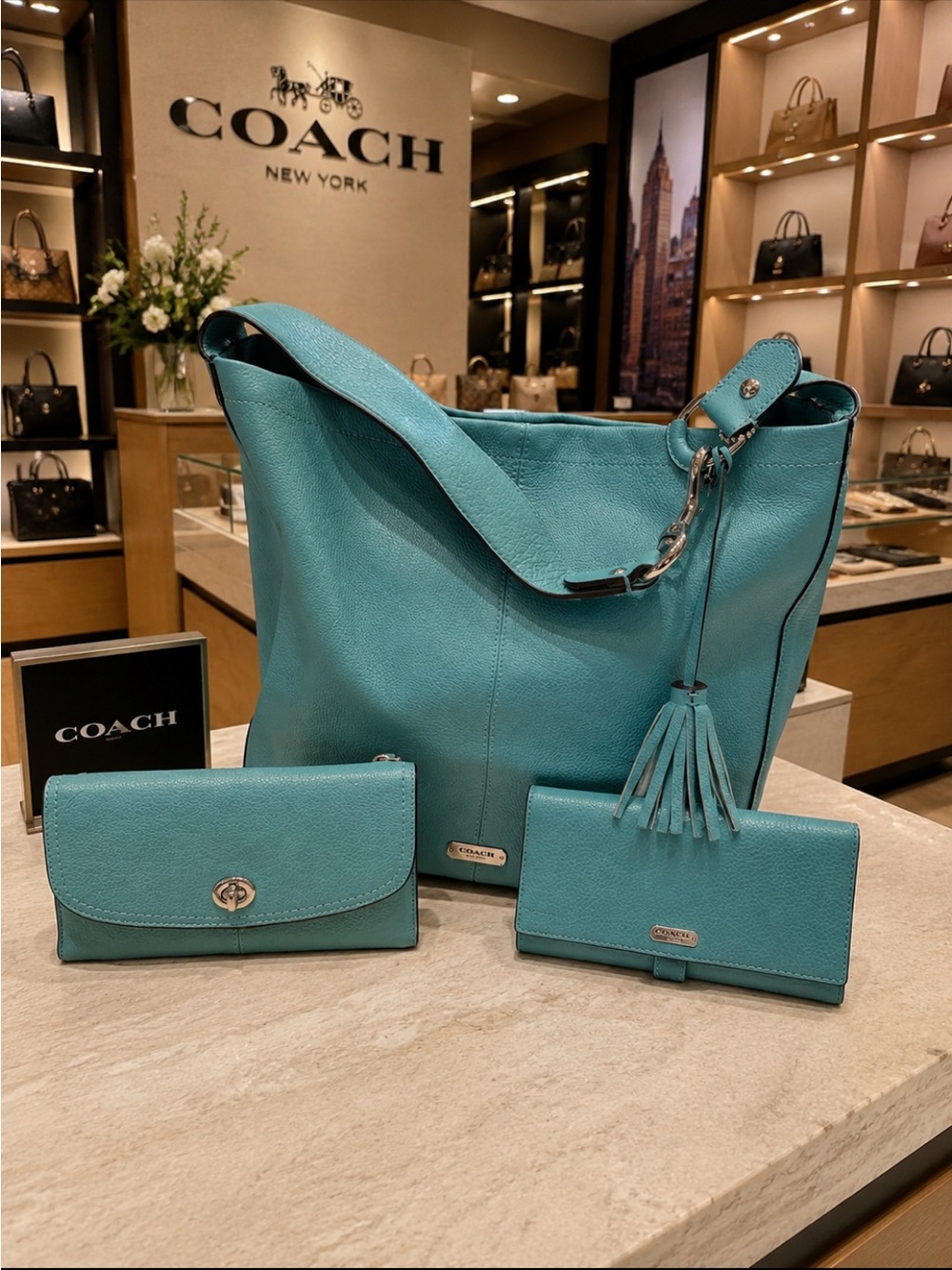 Coach Turquoise leather Hobo Bag with Tassel and Matching Coach Wallets Set